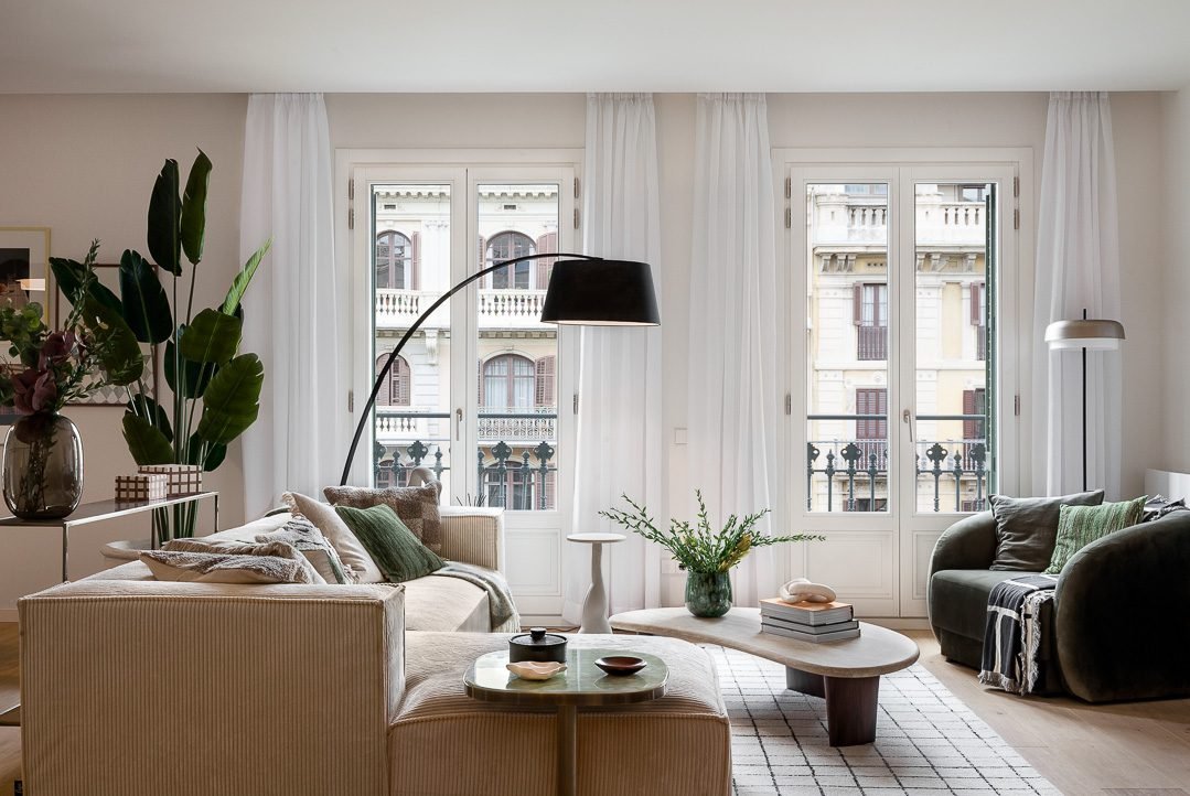 stylish residential apartment in modernist building. Interior designer styled mid century modern with earthy hues