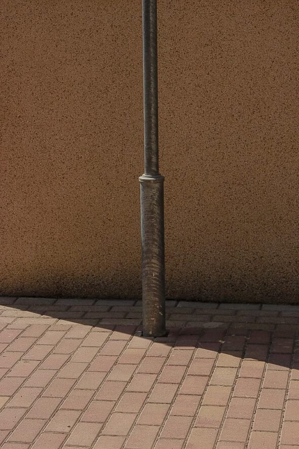 A lampost with cross shade