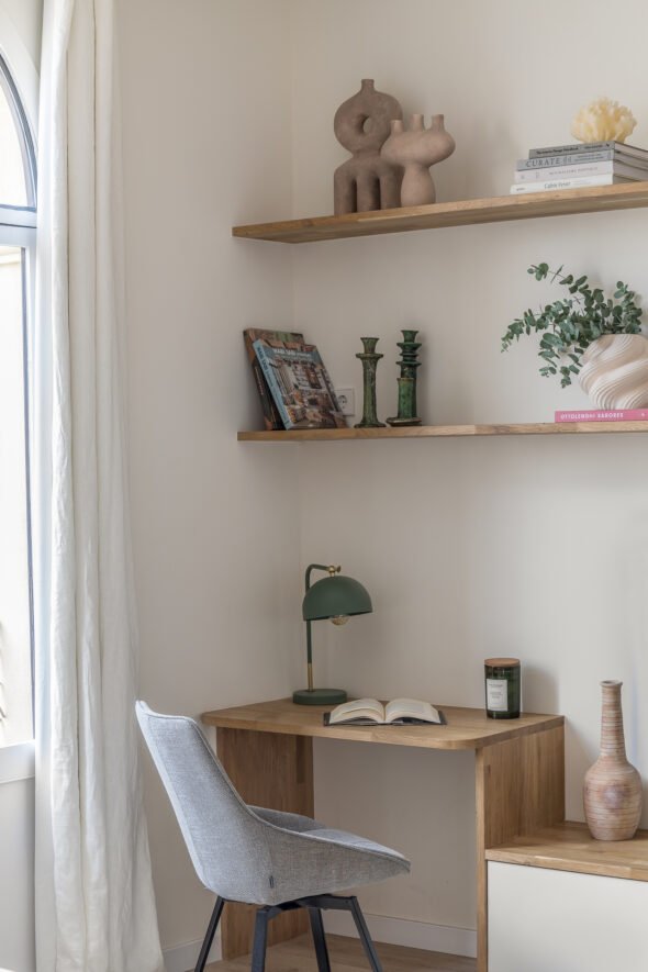 minimalist and modern scandi style work station wooden table and contemporary accessories in barcelona apartment