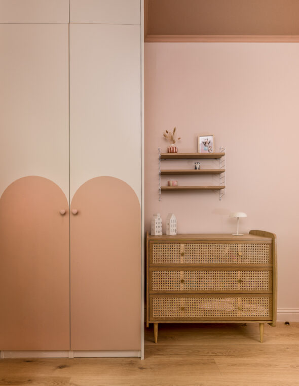 Baby Pink custom built wardrobe with heart shape design, wooden chest of drawers and shelving for a child bedroom